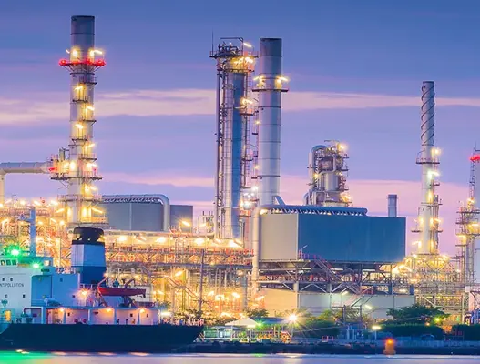 Nighttime image showing the skyline with tower blocks in view 